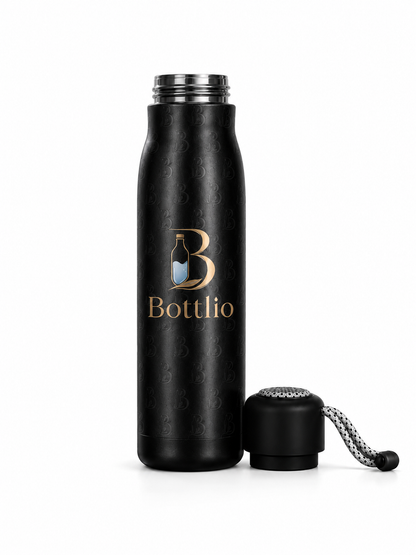 Bottlio Blush School Bottle slim bottle with wrist strap.